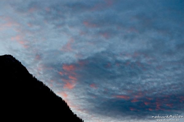 Wolken im Abendlicht, Flanke des Grünstein, Schönau am Königssee, Deutschland